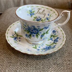 Vintage Royal Albert/Doulton Footed Cup & Saucer set. Flower of the Month Series